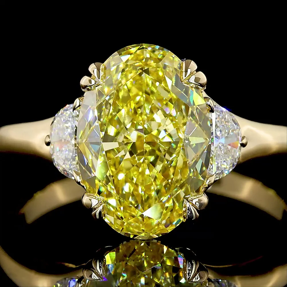 14K Yellow Gold Two-Tone Three Stone Ring with 3.02 Carat Oval Fancy Intense Yellow Lab Diamond and 0.30 Carat Half-Moon Side Stones - Total Carat Weight 3.32 - Covaloro Fine Jewelry - Image 2