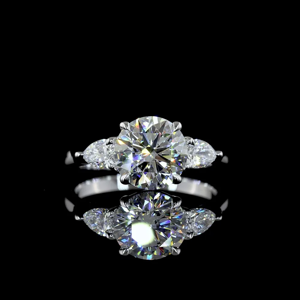 18K White Gold 3-Stone Ring with 2.19 Carats Round Brilliant Lab Diamond and 0.42 Carats Pear Shaped Side Diamonds - 2.61 Carats Total Diamond Weight - Covaloro Fine Jewelry
