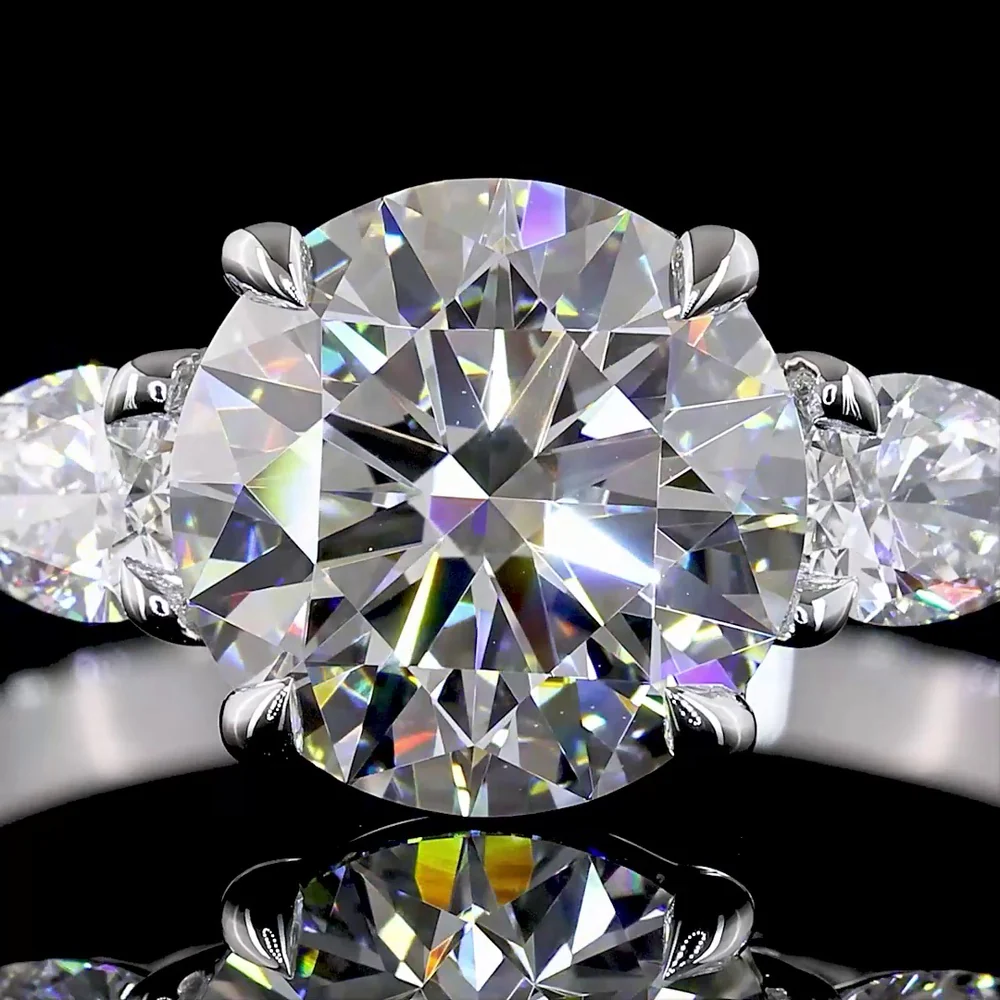 18K White Gold 3-Stone Ring with 2.19 Carats Round Brilliant Lab Diamond and 0.42 Carats Pear Shaped Side Diamonds - 2.61 Carats Total Diamond Weight - Covaloro Fine Jewelry - Image 2