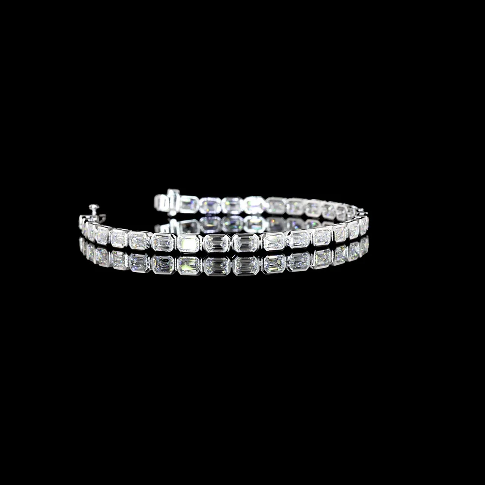 18K White Gold 7.04 Carat Tennis Bracelet with East-West Bezel Set Emerald Cut Lab Diamonds - 30 Stones of E-F VS1 Quality - Covaloro Fine Jewelry