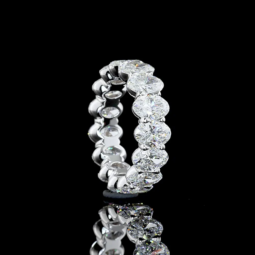 18K White Gold Eternity Band with North-South Prong Set Oval Cut Lab Diamonds - 7.51 Total Carat Weight, E-F Color, VS Clarity - Covaloro Fine Jewelry - Image 4