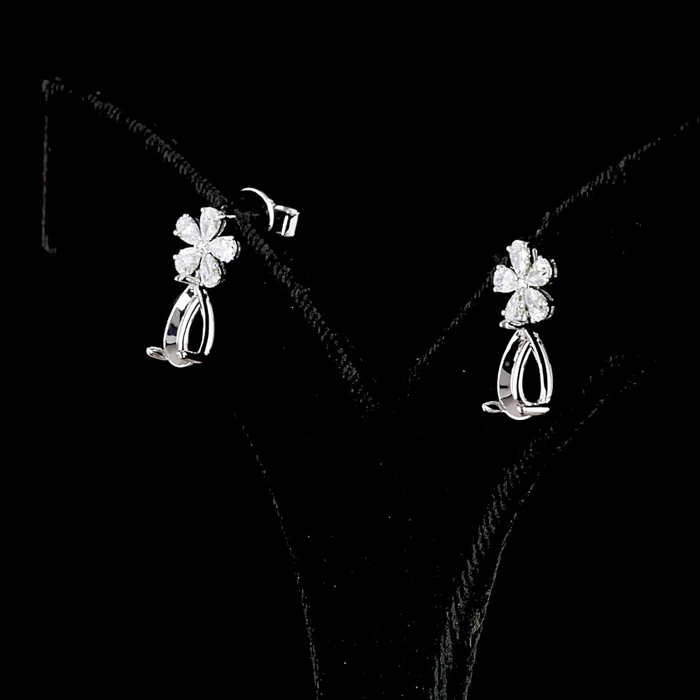 18K White Gold Floral Drop Earrings with Pear Shape Diamond Clusters and Open Pear Motif - 0.75 Carats Total Diamond Weight - Covaloro Fine Jewelry - Image 3