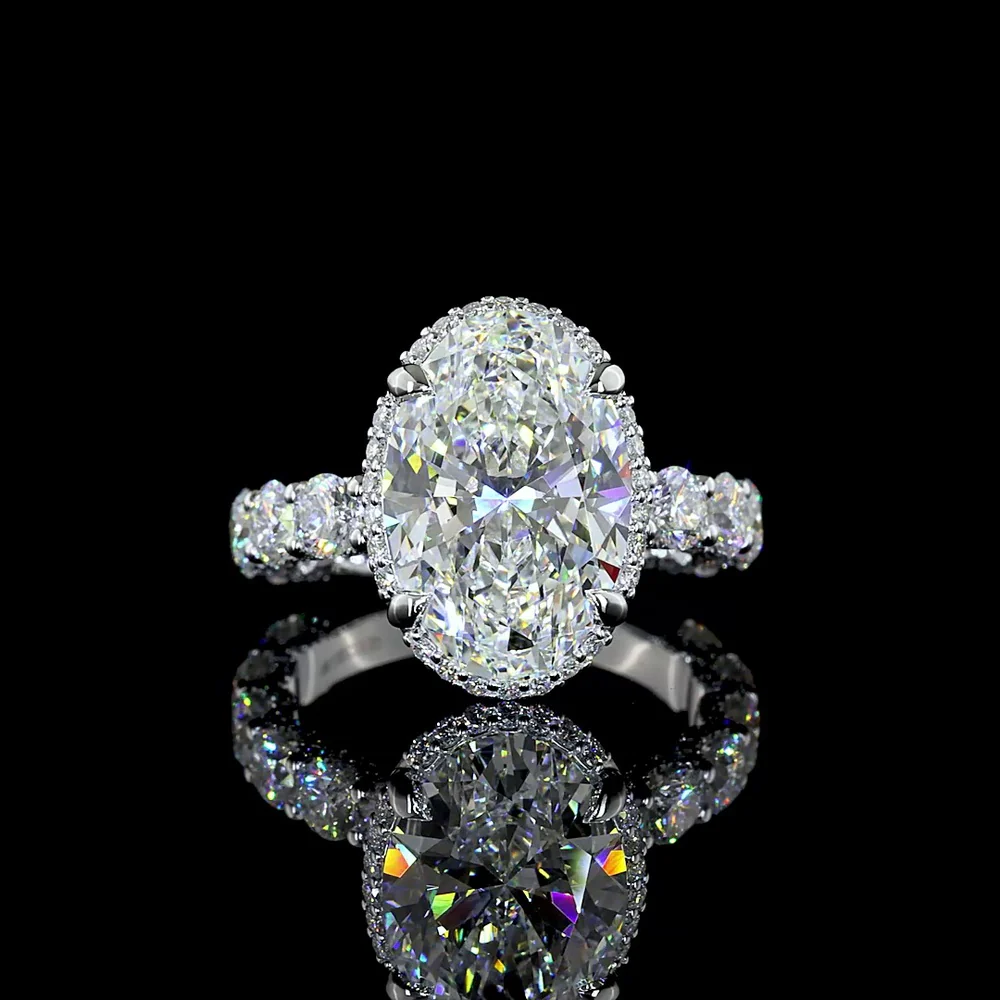 18K White Gold Hidden Halo Ring with 5.01 Carat Oval Cut E VVS2 Lab Diamond and 2.58 Carat Brilliant Round Accent Diamonds - Total 7.59 Carats - Covaloro Fine Jewelry