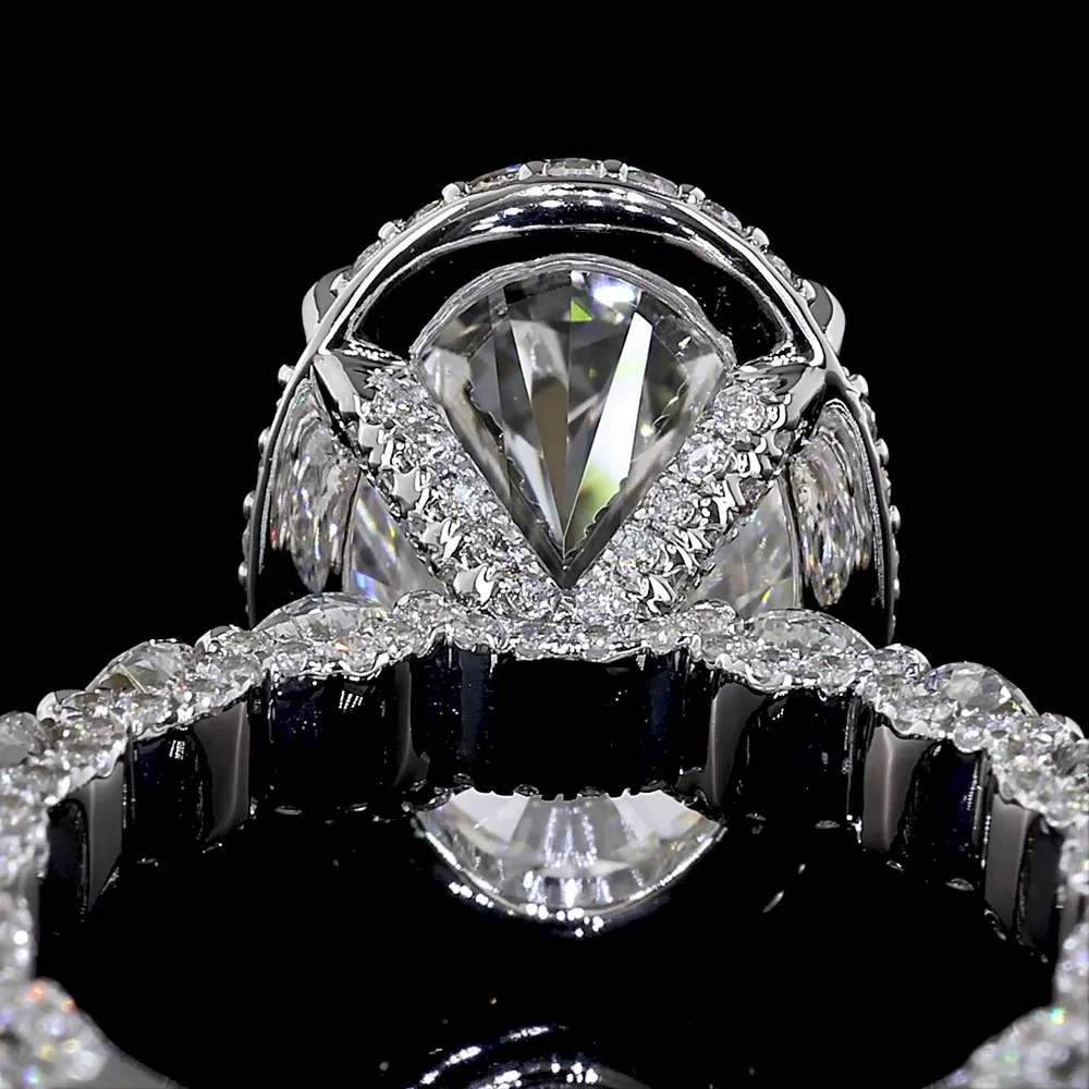 18K White Gold Hidden Halo Ring with 5.01 Carat Oval Cut E VVS2 Lab Diamond and 2.58 Carat Brilliant Round Accent Diamonds - Total 7.59 Carats - Covaloro Fine Jewelry - Image 3