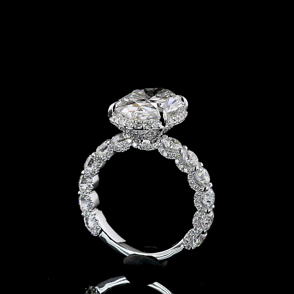 18K White Gold Hidden Halo Ring with 5.01 Carat Oval Cut E VVS2 Lab Diamond and 2.58 Carat Brilliant Round Accent Diamonds - Total 7.59 Carats - Covaloro Fine Jewelry - Image 4