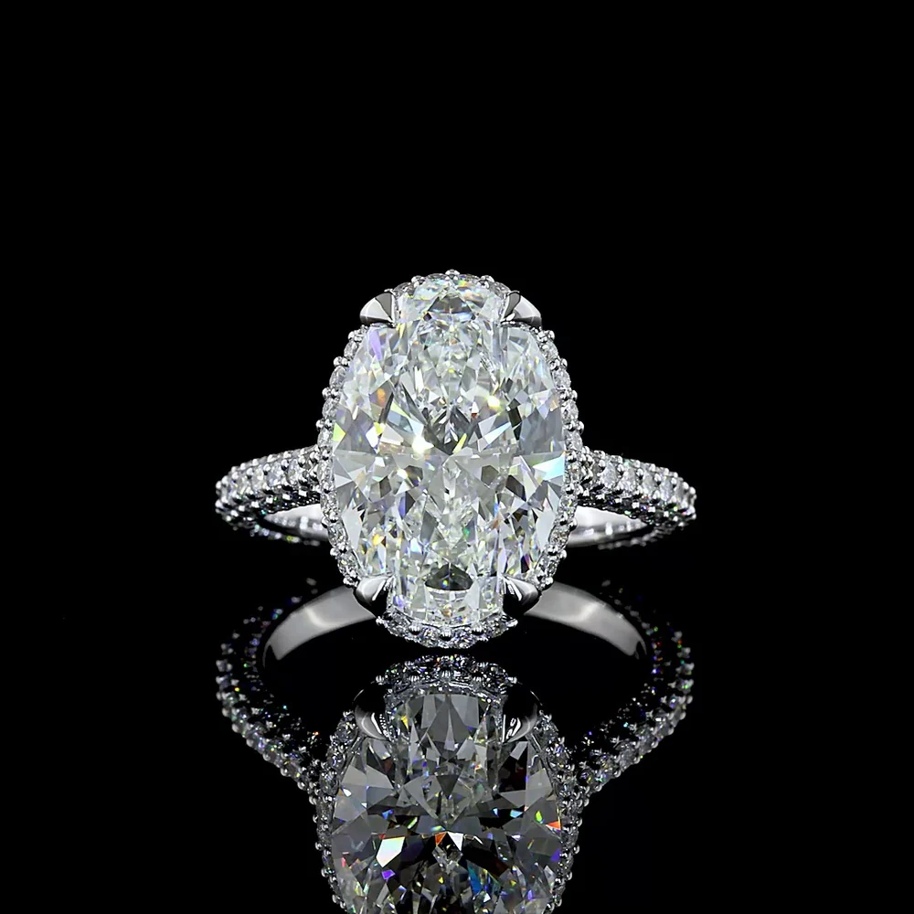 18K White Gold Hidden Halo Ring with 5.09 Carat Oval Cut Lab Diamond Center and 1.39 Carat Accent Diamonds - 6.48 Total Carat Weight - Covaloro Fine Jewelry