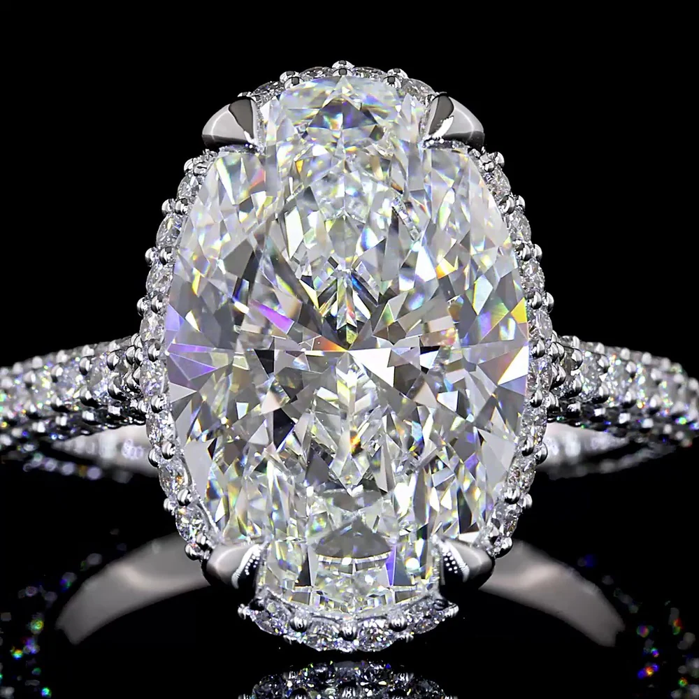 18K White Gold Hidden Halo Ring with 5.09 Carat Oval Cut Lab Diamond Center and 1.39 Carat Accent Diamonds - 6.48 Total Carat Weight - Covaloro Fine Jewelry - Image 2