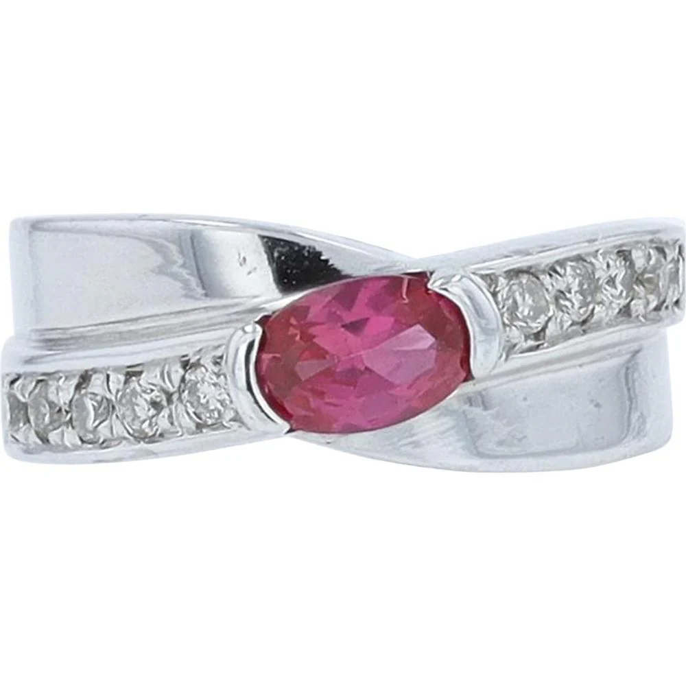 18K White Gold Ring with 0.55 Carat Oval Ruby and 0.20 Carat Round Diamond Accents
