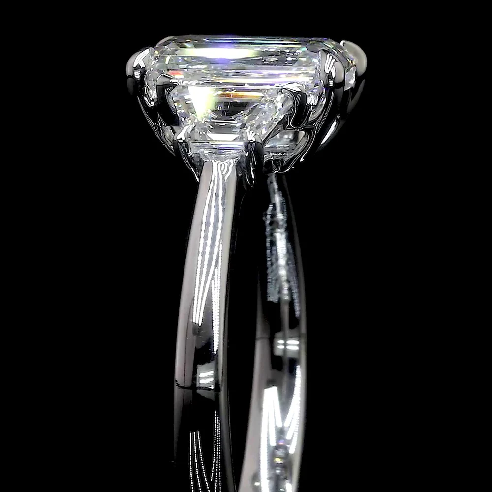 18K White Gold Three-Stone Ring with 2.00 Carat Emerald Cut Lab Diamond and 0.91 Carat Trapezoid Cut Lab Diamonds - 2.91 Total Carat Weight - Covaloro Fine Jewelry - Image 4