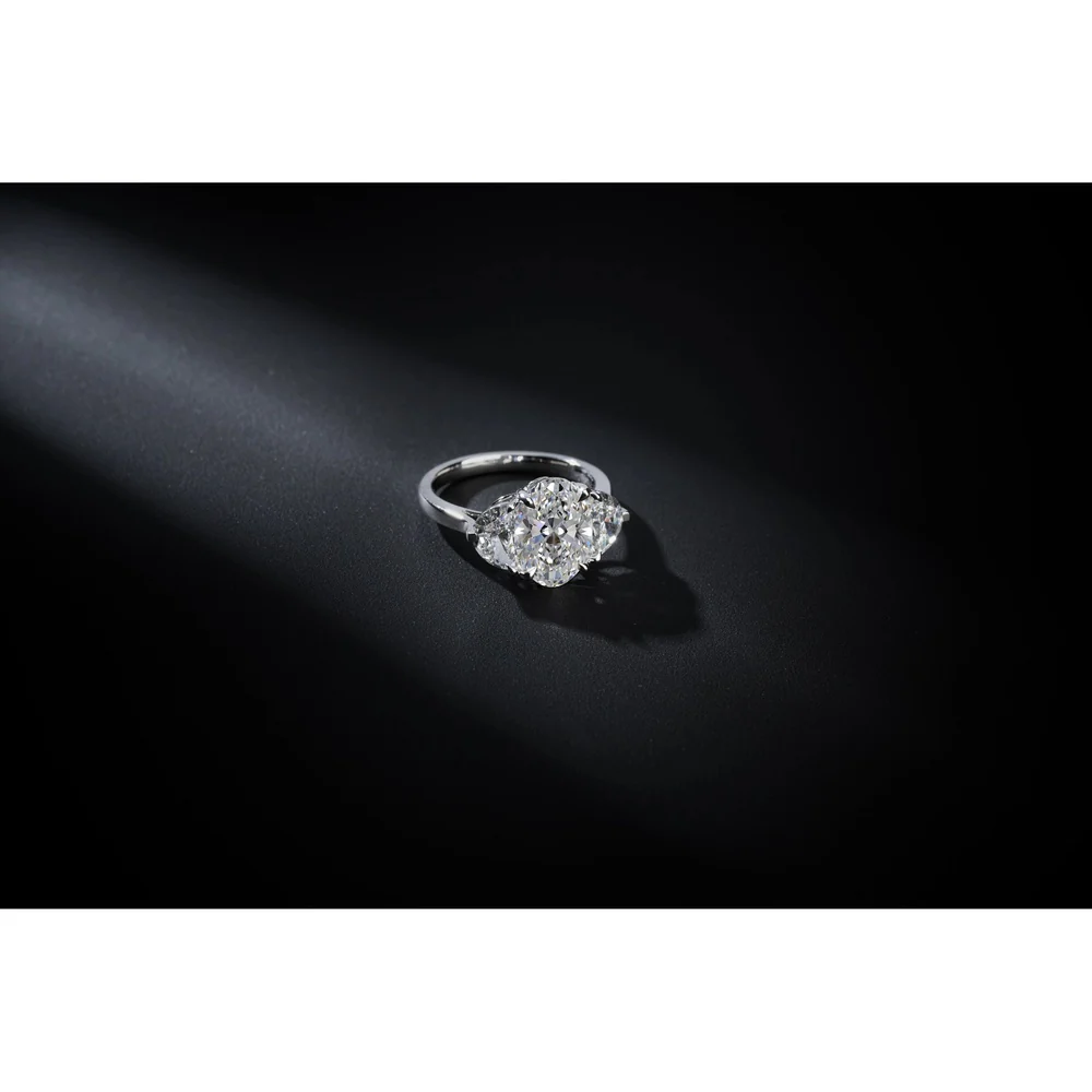 18K White Gold Three Stone Ring with 3.54 Carat Oval Lab Diamond and Half-Moon Side Stones - 5.28 Carat Total Diamond Weight - Covaloro Fine Jewelry - Image 4