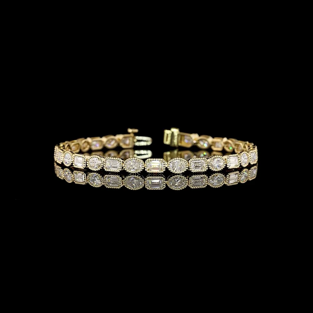 18K Yellow Gold 7.52 Carat East-West Tennis Bracelet with Alternating Emerald and Oval Cut Lab Diamonds in Bezel Settings - Covaloro Fine Jewelry