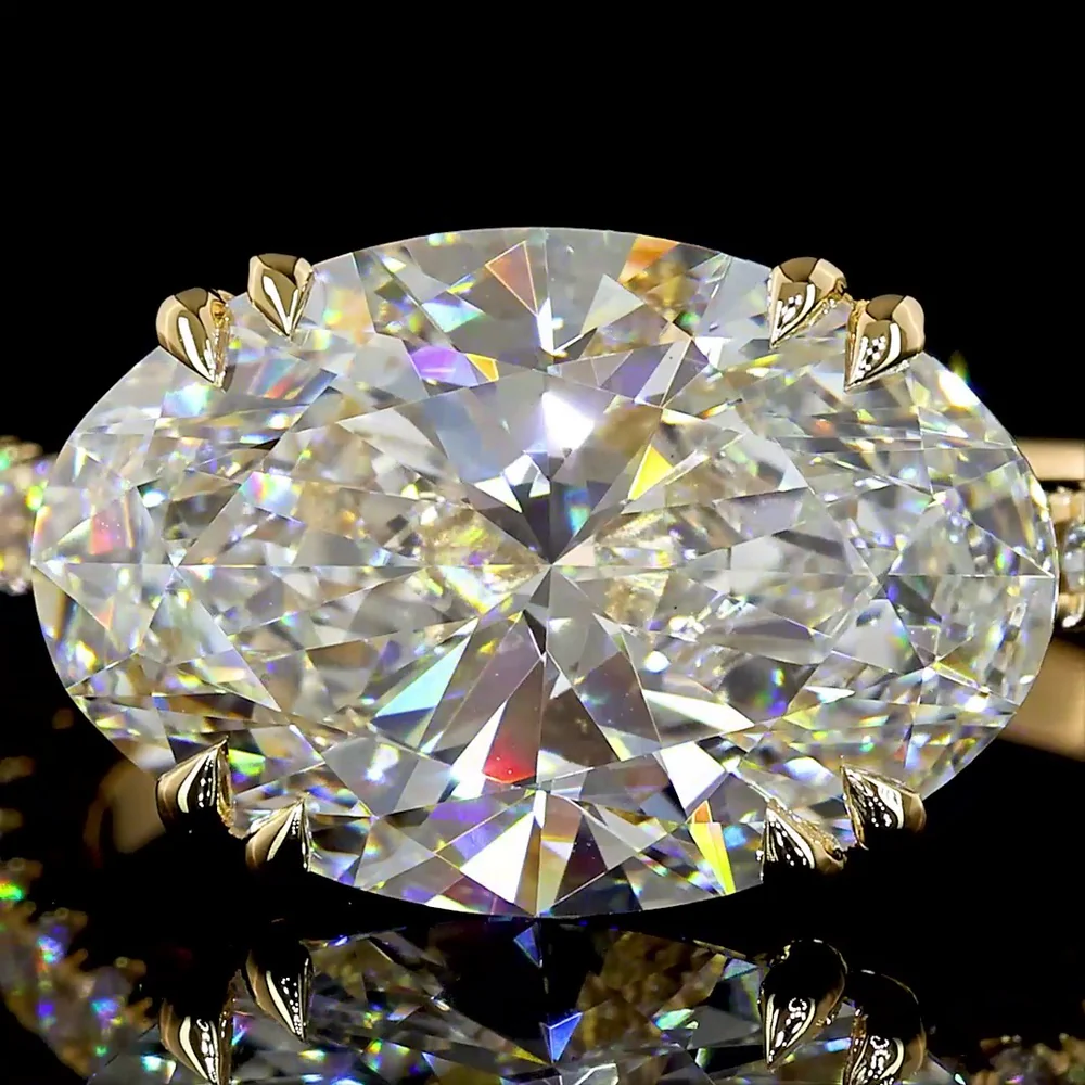 18K Yellow Gold East-West Hidden Halo Ring with 4.13 Carats Oval Lab Diamond and 0.65 Carats Round Diamond Accents - 4.78 Total Carat Weight IGI Certified - Covaloro Fine Jewelry - Image 2