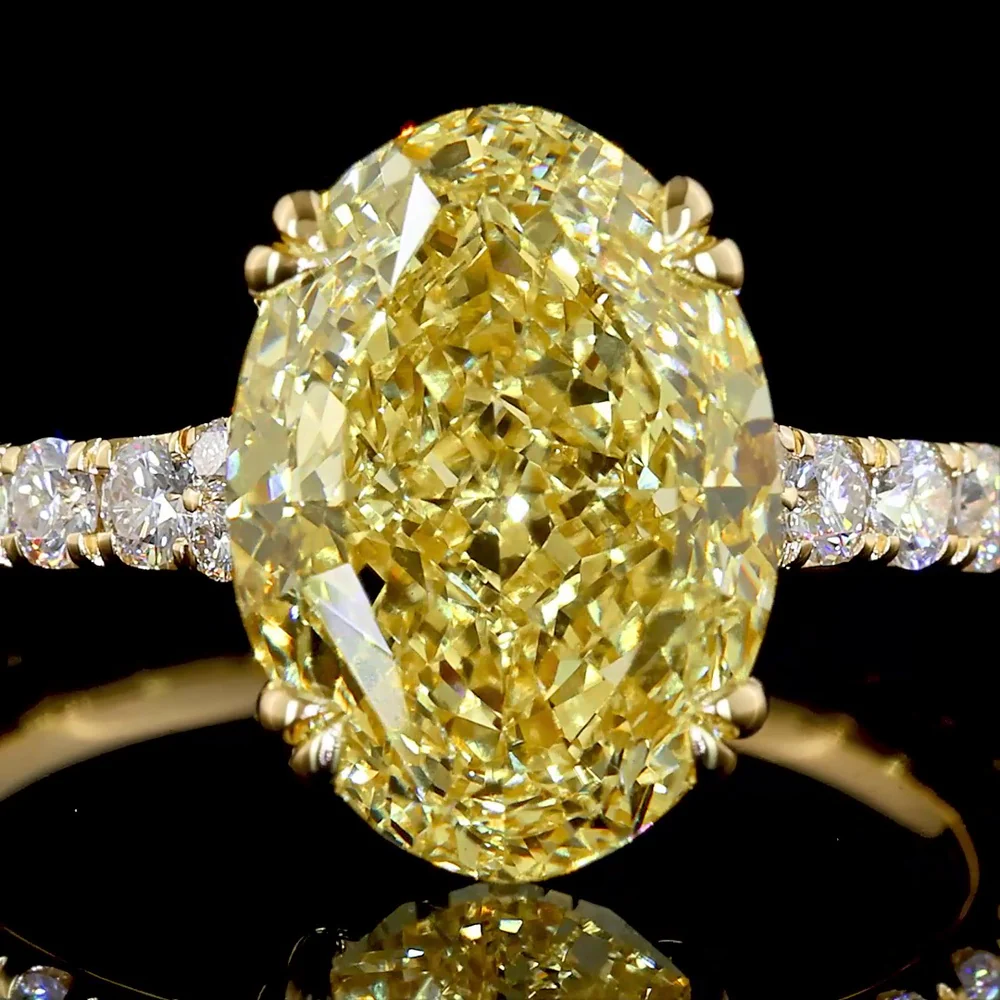 18K Yellow Gold Oval Cut Fancy Vivid Yellow Diamond Solitaire Shank Ring - 4.84 Carat Total Diamond Weight with 18 Round Brilliant Accents - Covaloro Fine Jewelry - Image 2