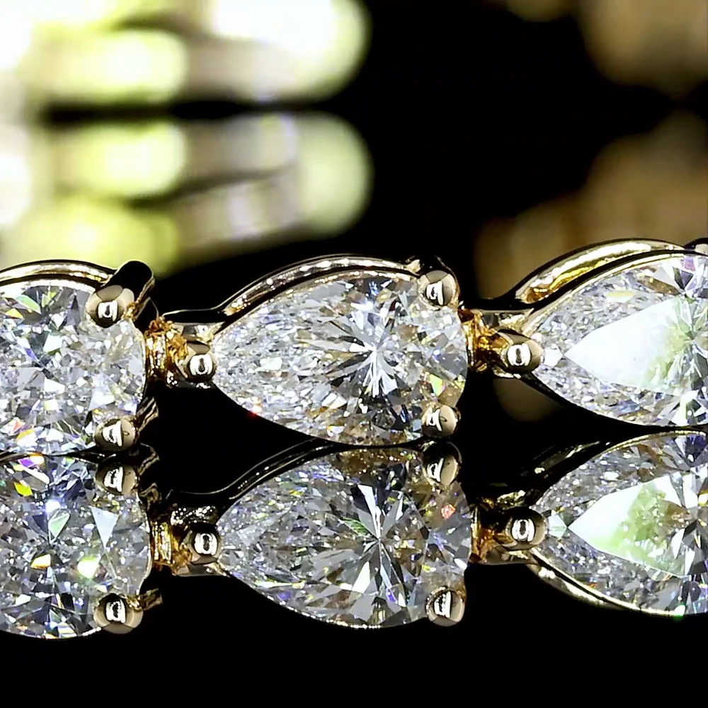 18K Yellow Gold Tennis Bracelet with East-West Set Pear Shaped Lab Diamonds - 3.85 Carats Total Weight, E-F Color, VS Clarity - Covaloro Fine Jewelry - Image 3