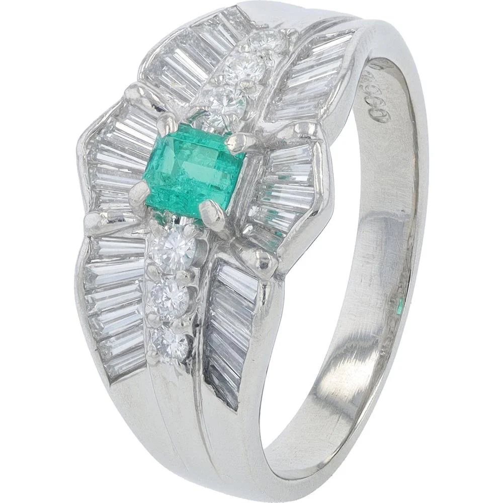 Platinum 0.22 Carat Emerald Ring with 0.68 Carat Round and Baguette Diamonds