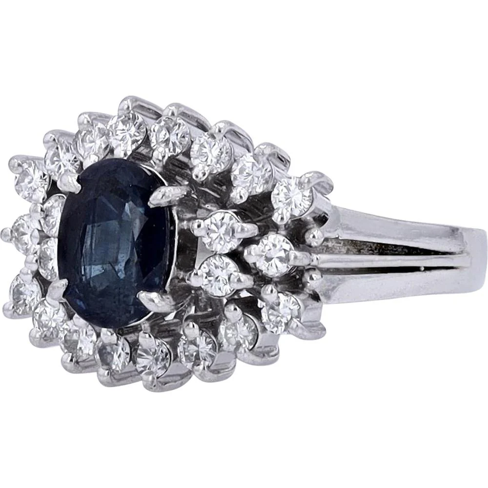 Platinum 1.54 Carat Oval Sapphire Ring with 0.45 Carat Diamond Halo - Image 2