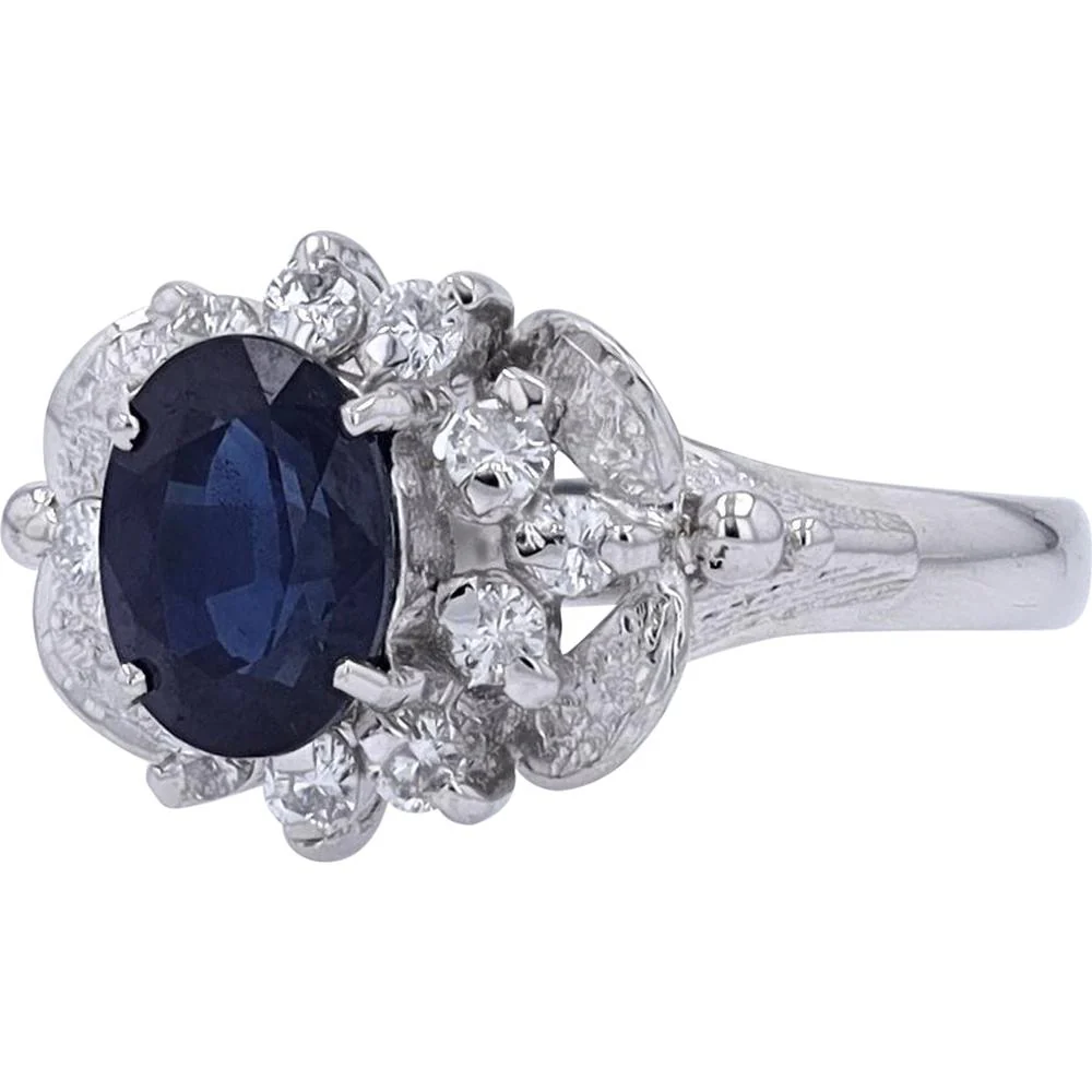 Platinum 1.81 Carat Oval Sapphire Ring with 0.30 Carats Diamond Halo - Image 2