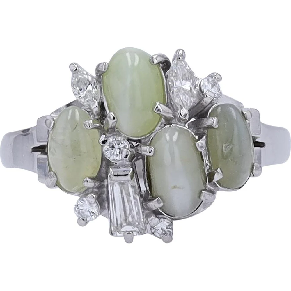 Platinum 2.40 Carat Chrysoberyl Four Stone Ring with 0.34 Carat Diamond Accents