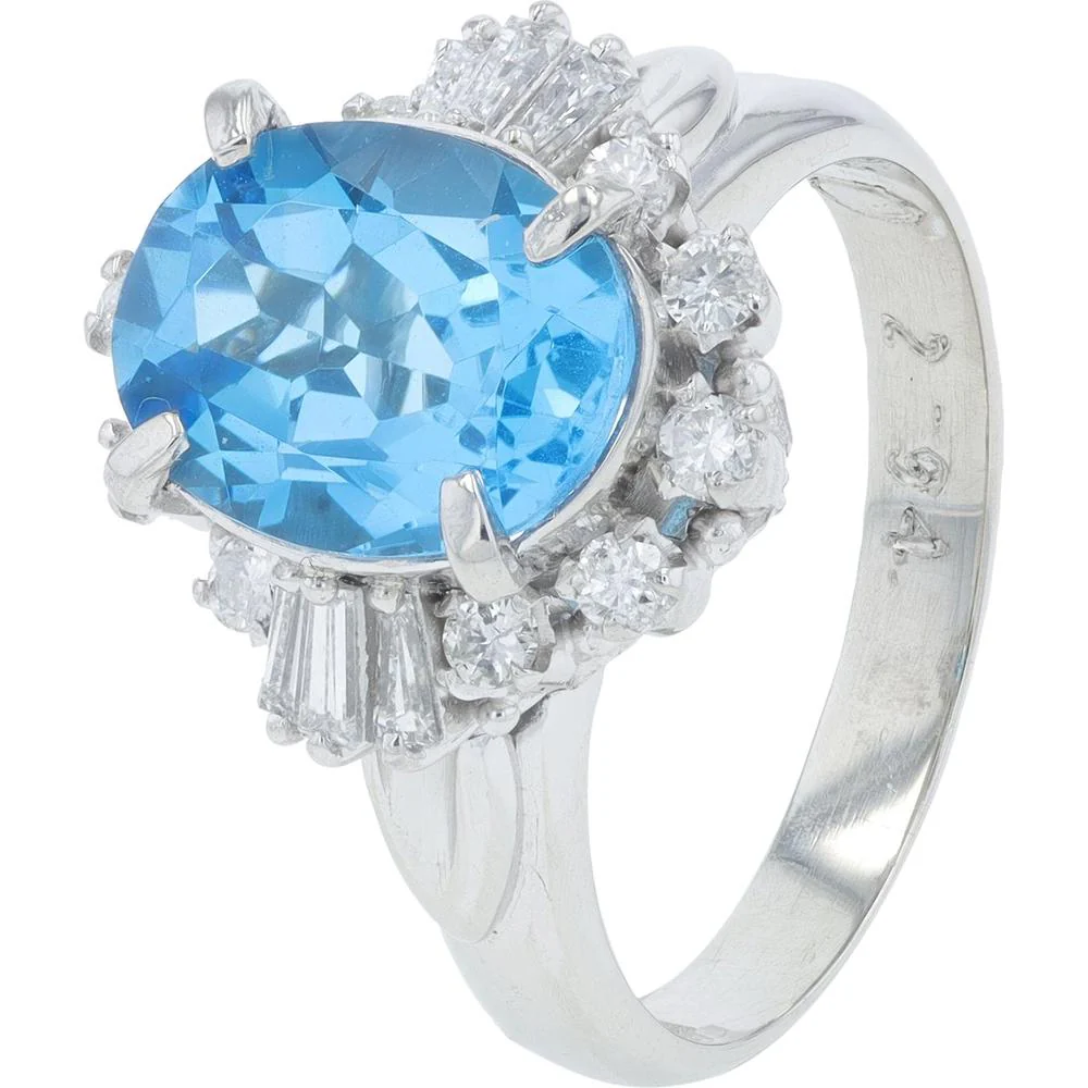 Platinum 2.94 Carat Oval Blue Topaz Ring with 0.40 Carat Diamond Halo