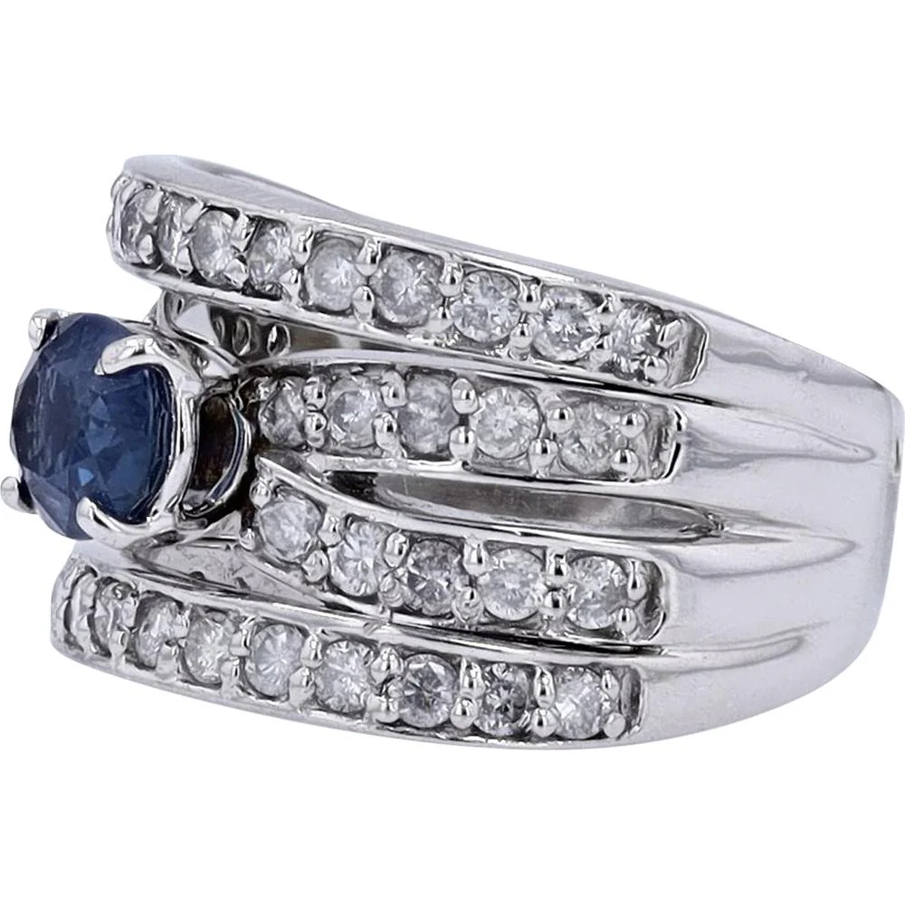 Platinum 900 Crossover Ring with 1.02 Carat Oval Sapphire and 1.10 Carat Round Diamond Accents - Image 2