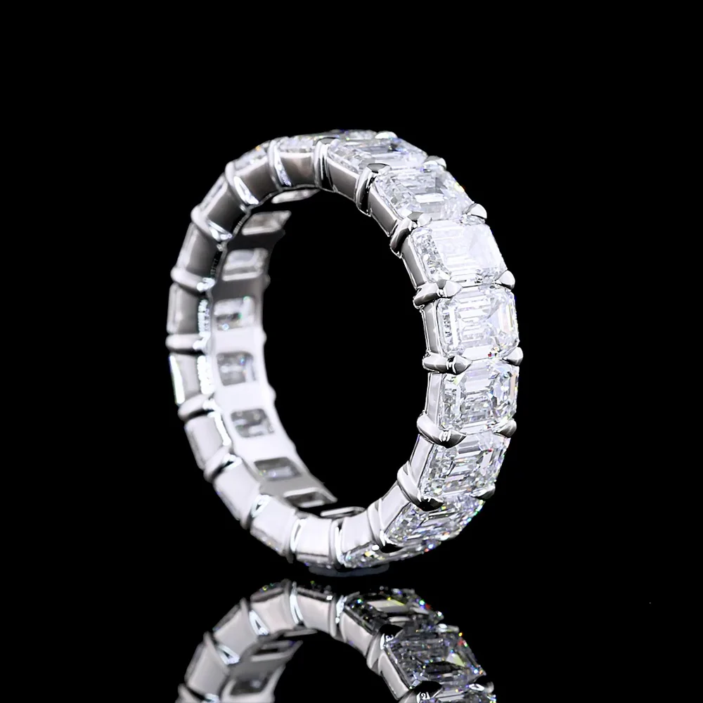 Platinum Eternity Band with 18 Emerald Cut Lab Diamonds in Prong Setting - 6.89 Carat Total Weight, E-F Color VS1 Clarity - Covaloro Fine Jewelry - Image 3