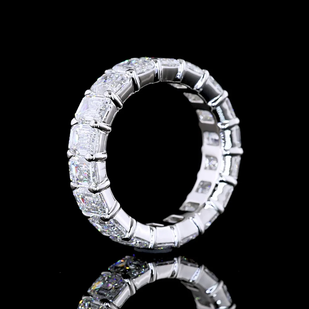 Platinum Eternity Band with 18 Emerald Cut Lab Diamonds in Prong Setting - 6.89 Carat Total Weight, E-F Color VS1 Clarity - Covaloro Fine Jewelry - Image 4