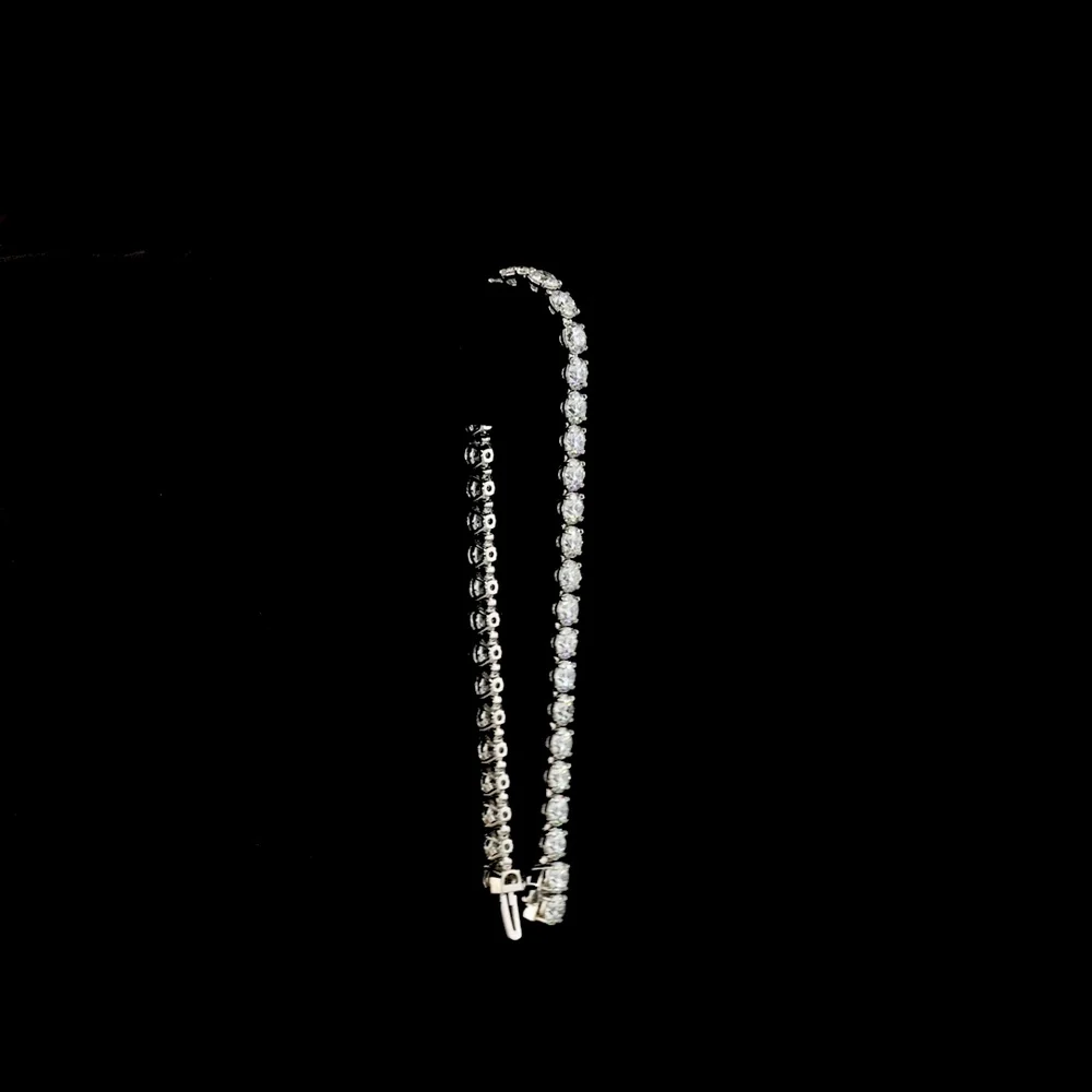 Platinum Tennis Bracelet with 40 Prong-Set Round Lab Diamonds - 12.37 Carat Total Weight, E-F Color VS2 Clarity - Covaloro Fine Jewelry - Image 3