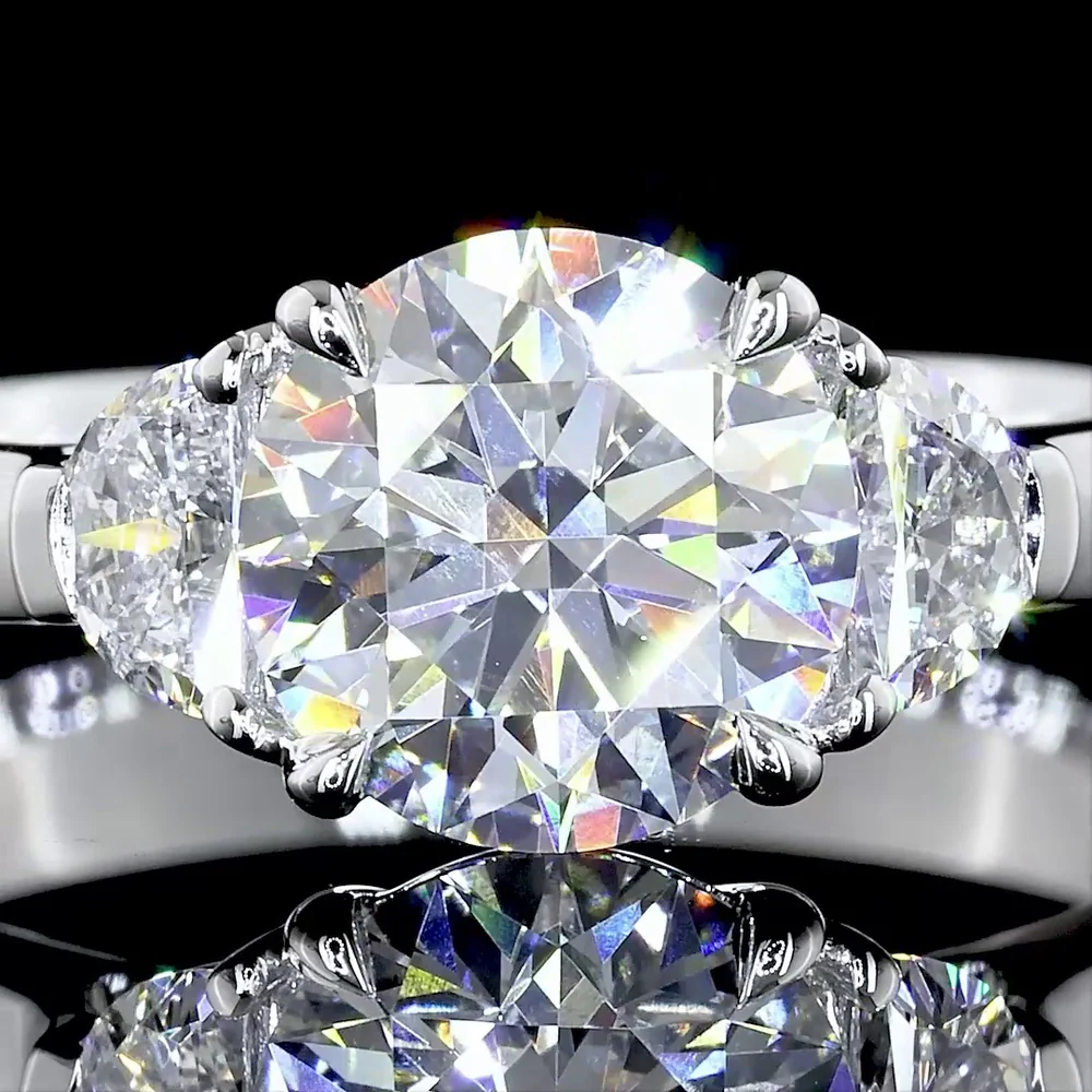 Platinum Three-Stone Ring with 1.55 Carat Round Brilliant Lab Diamond and 0.37 Carat Half-Moon Side Diamonds - 1.92 Carat Total Weight - Covaloro Fine Jewelry - Image 2