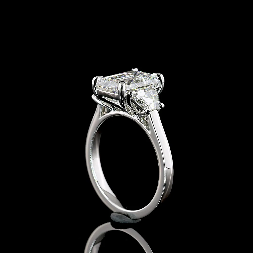 Platinum Three Stone Ring with 3.18 Carat Emerald Cut Lab Diamond and 1.07 Carat Trapezoid Cut Lab Diamonds - 4.25 Carat Total Weight - Covaloro Fine Jewelry - Image 3