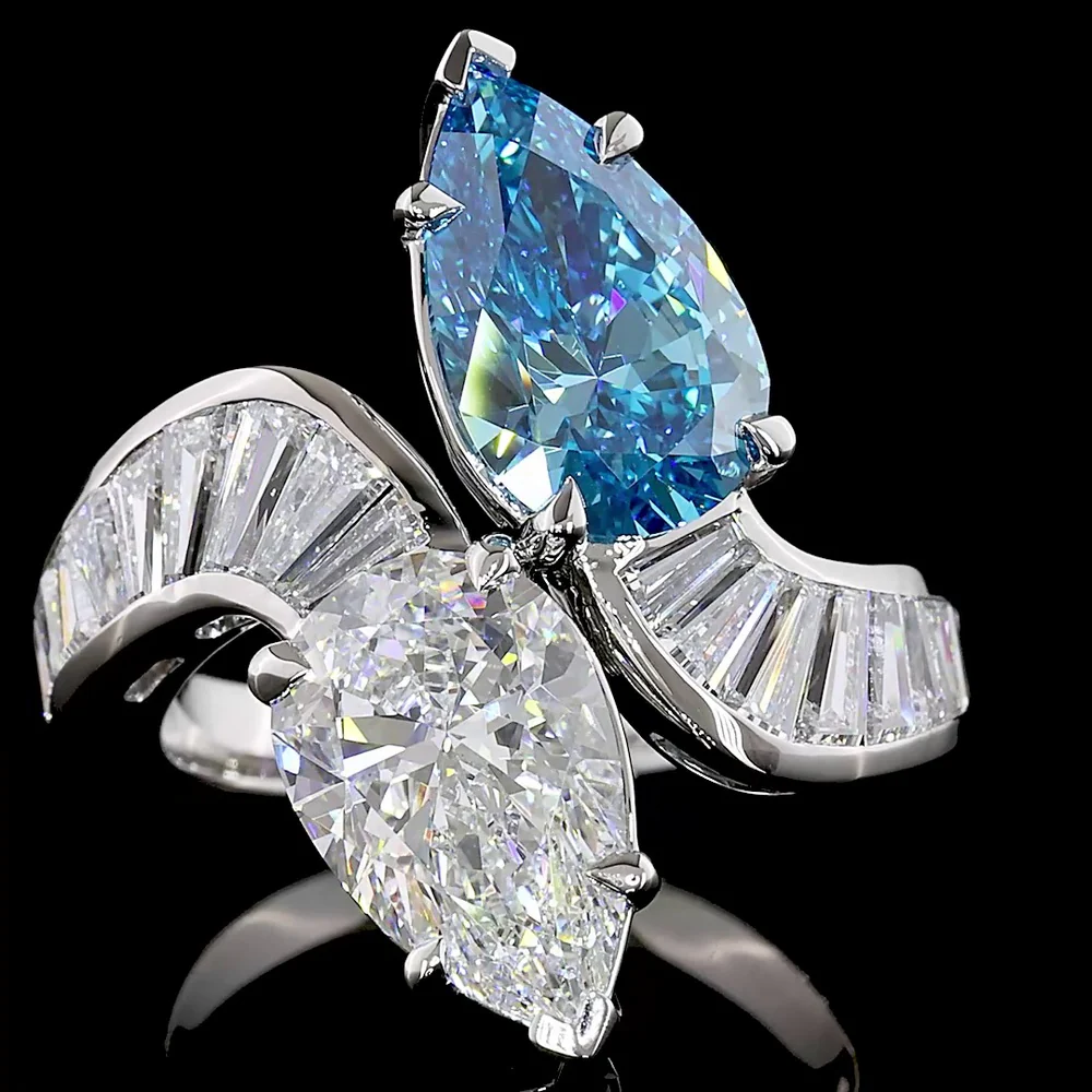 Platinum Toi et Moi Ring with Pear Shape Fancy Vivid Blue and White Lab Diamonds - 2.66 Carats Blue Diamond, 2.77 Carats White Diamond, Plus Baguette Accents - 7.09 Total Carat Weight - Covaloro Fine Jewelry - Image 2