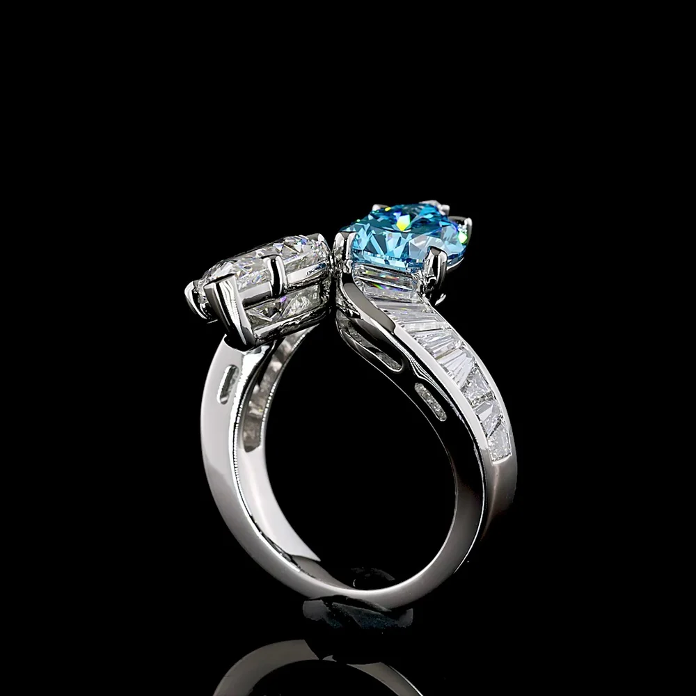 Platinum Toi et Moi Ring with Pear Shape Fancy Vivid Blue and White Lab Diamonds - 2.66 Carats Blue Diamond, 2.77 Carats White Diamond, Plus Baguette Accents - 7.09 Total Carat Weight - Covaloro Fine Jewelry - Image 3