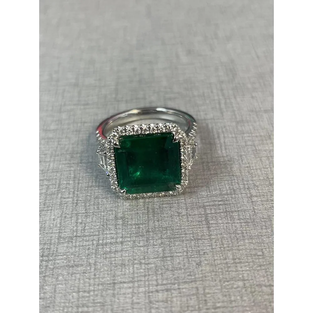 Roman & Jules - Platinum Ring with GIA-Certified 4.93 Carat Emerald Cut Emerald and 0.97 Carat Total Diamond Halo and Side Stones