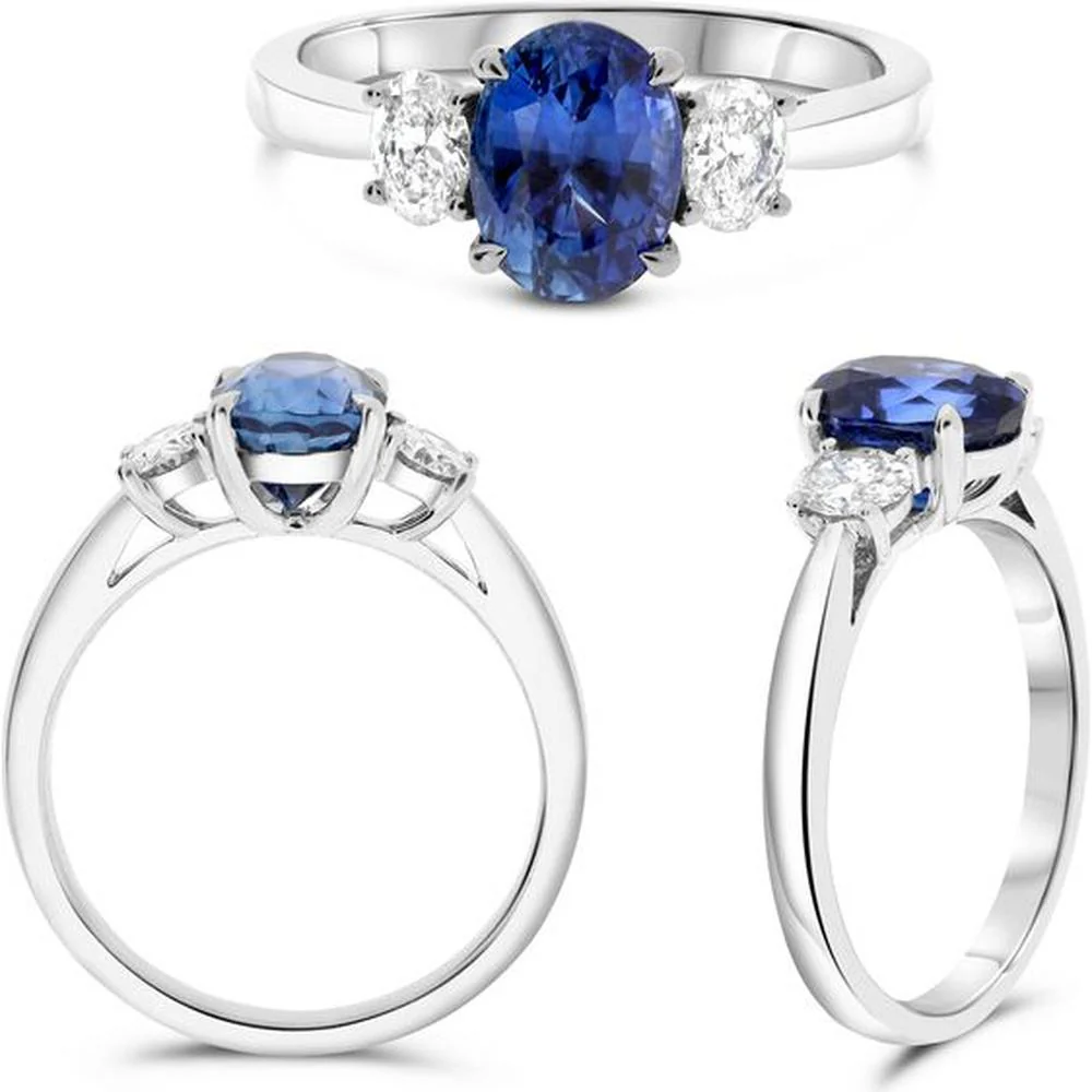 Roman & Jules - Platinum Three-Stone Ring with 1.30 Carat Oval Sapphire and Oval Diamond Accents