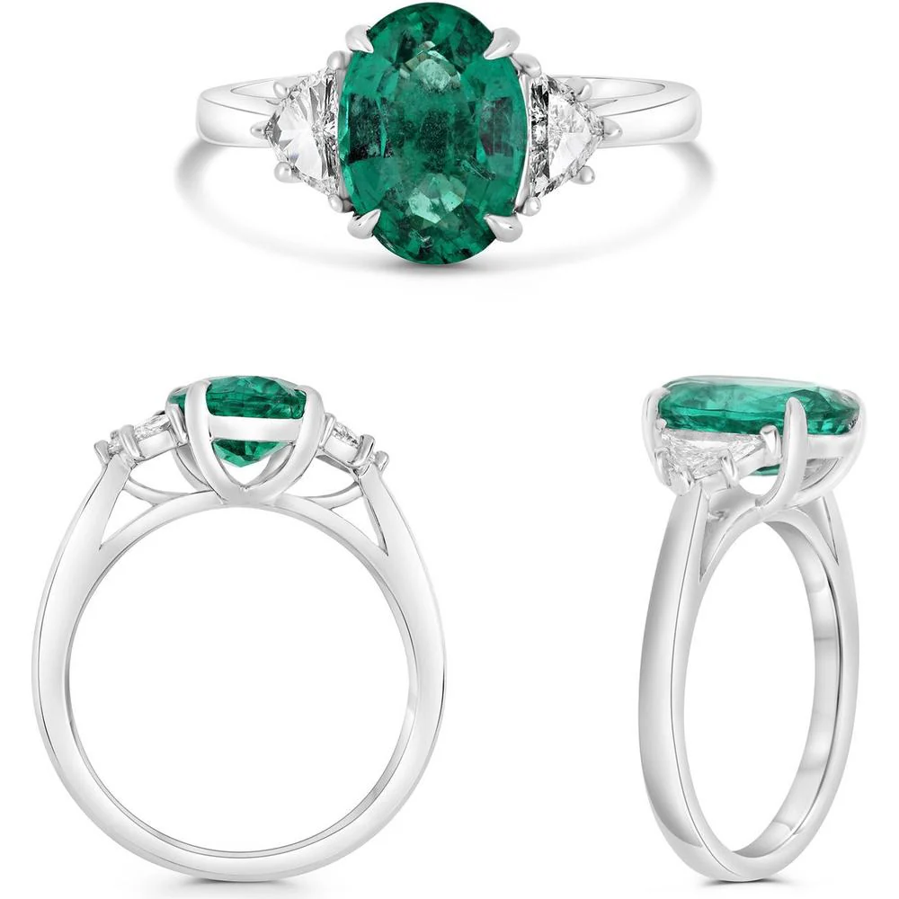 Roman & Jules - Platinum Three-Stone Ring with 2.21 Carat Oval Emerald and 0.31 Carat White Diamonds