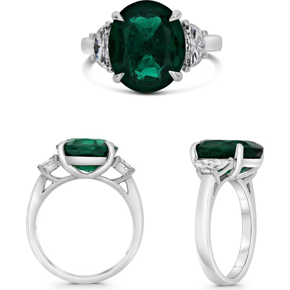 Roman & Jules - Platinum Three-Stone Ring with 4.47 Carat Oval Emerald and Tapered Diamonds